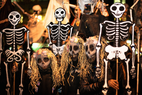 New York Halloween parade with skeleton figures