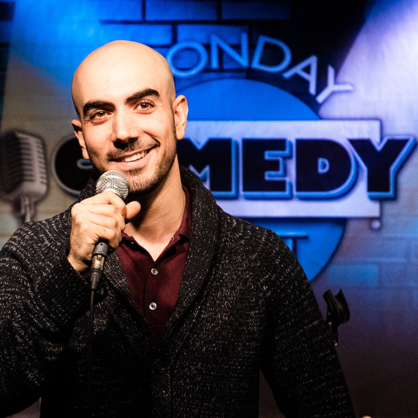 Joze Piranian performing at a comedy club in Calgary (Photo: James Moore)