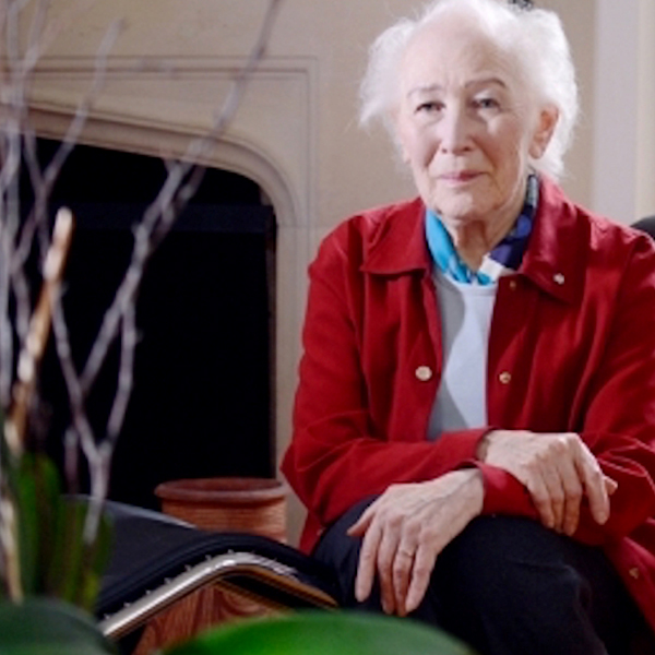 Blanche Lemco sitting and smiling