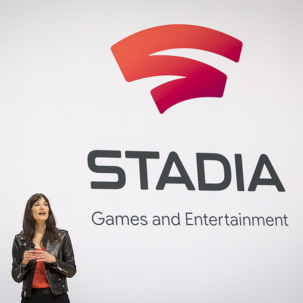 Jade Raymond presenting in front the Stadia logo