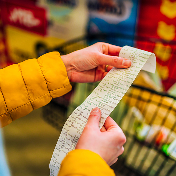 Person holding a receipt