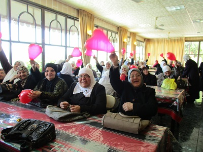 Local Palestinian women gathered in a room