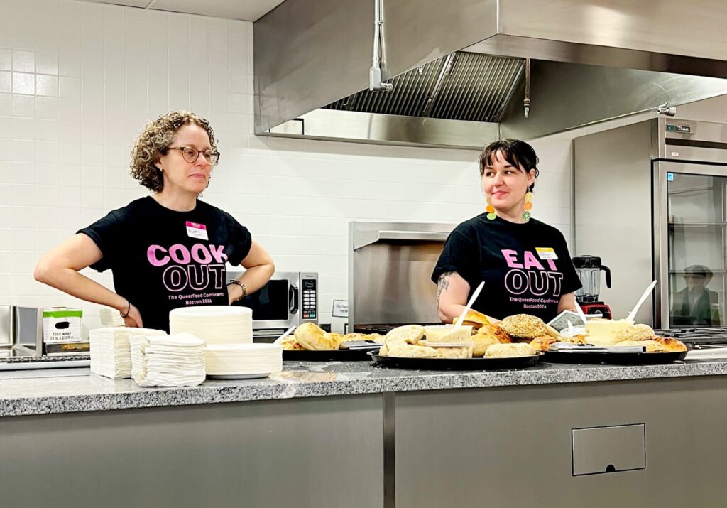 A couple of women in a kitchen