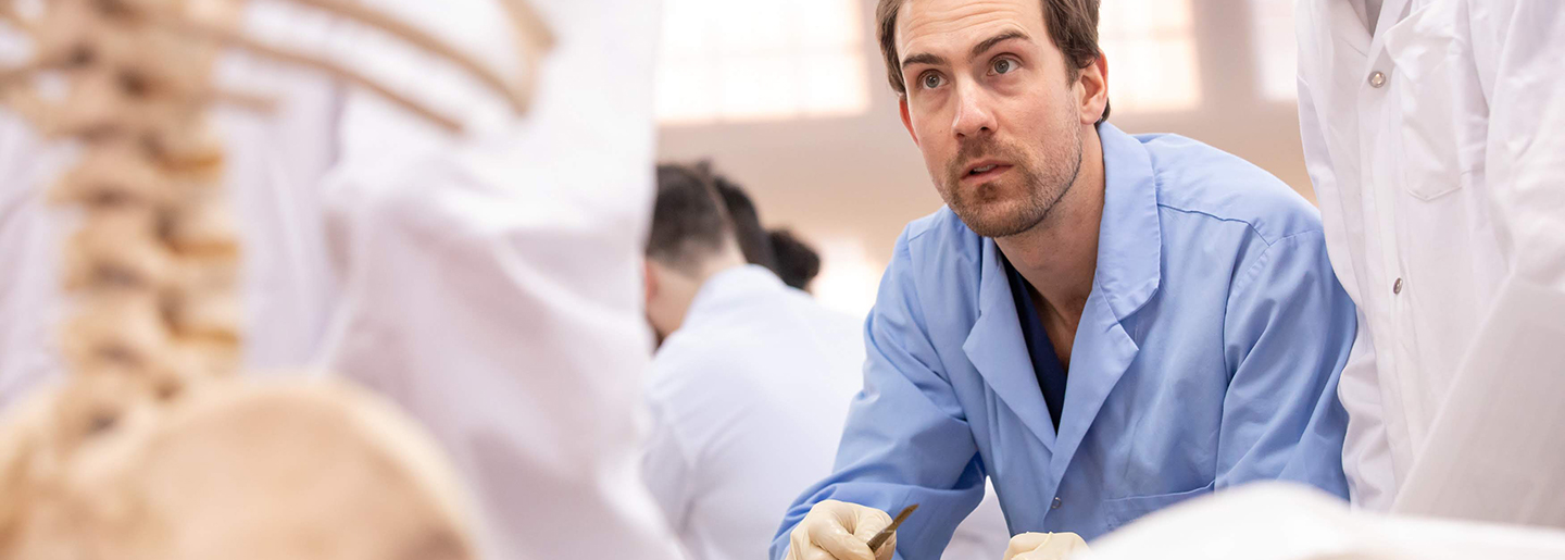 A group of people in lab coats