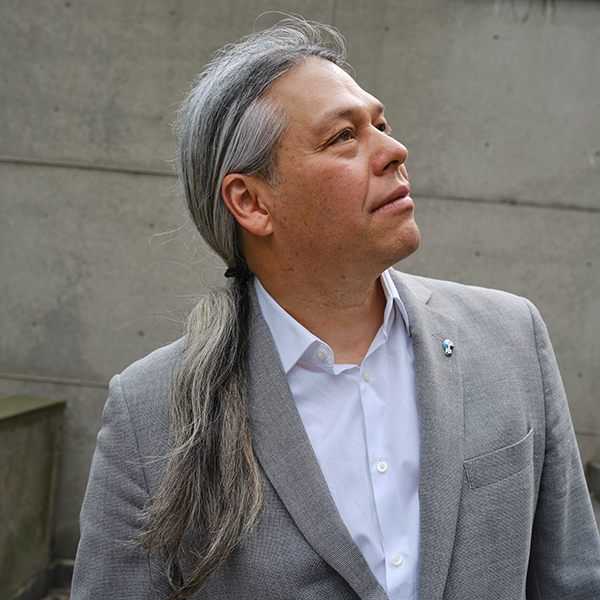 A person with long gray hair