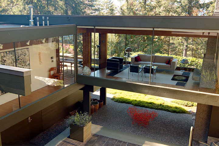 A view of a modern glass house.